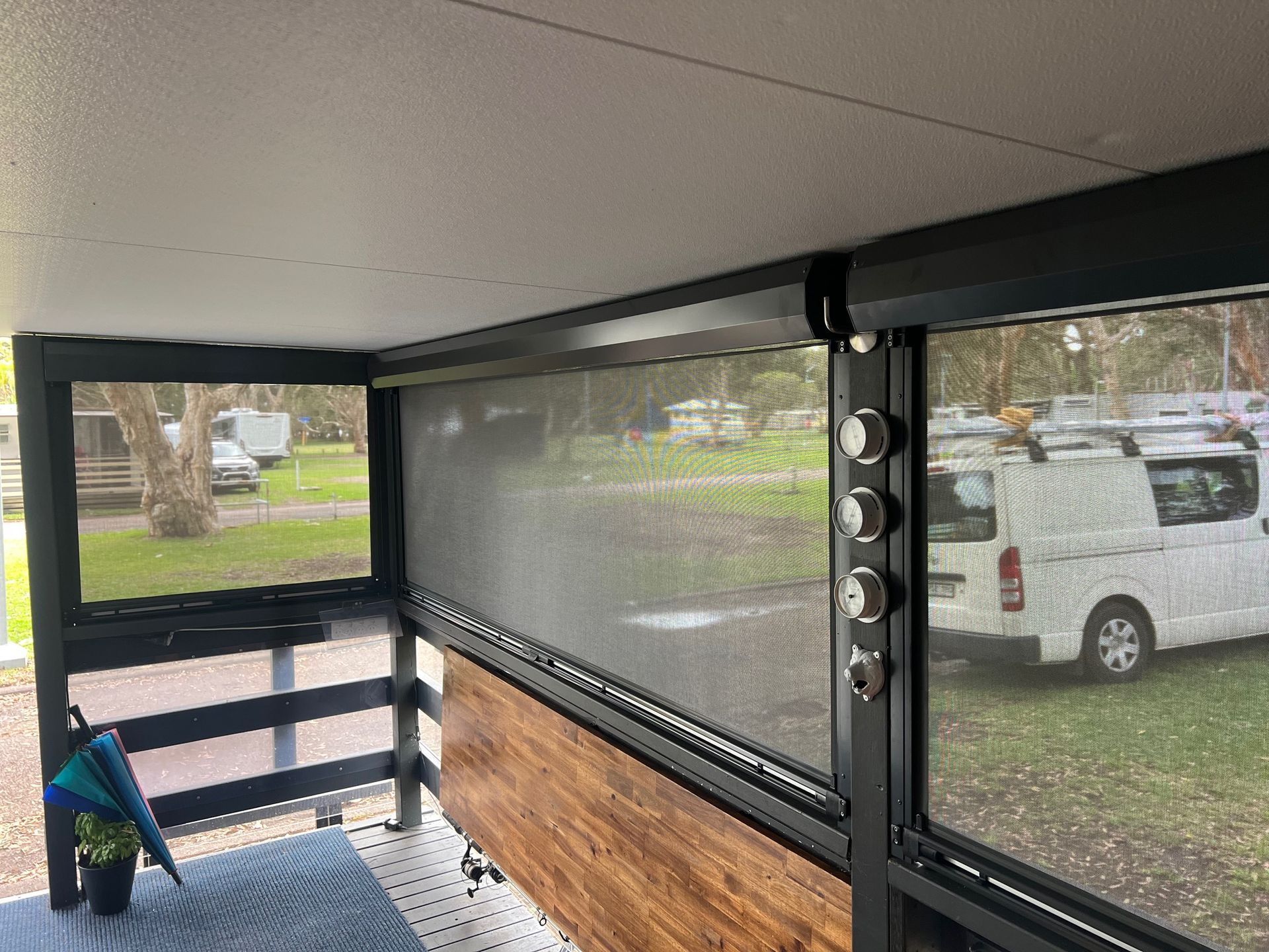 Two White Roller Blinds Outside — Outdoor Blinds In Berkeley Vale, NSW