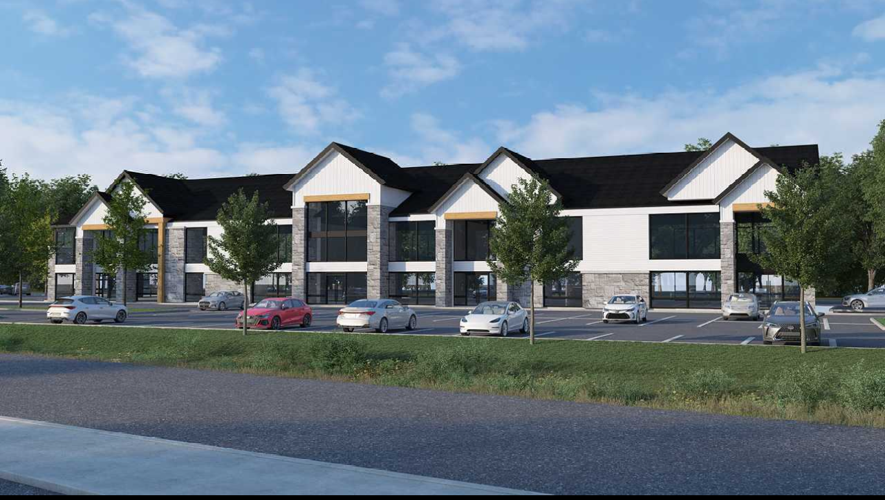 Une impression d'artiste d'un bâtiment avec des voitures garées devant lui.