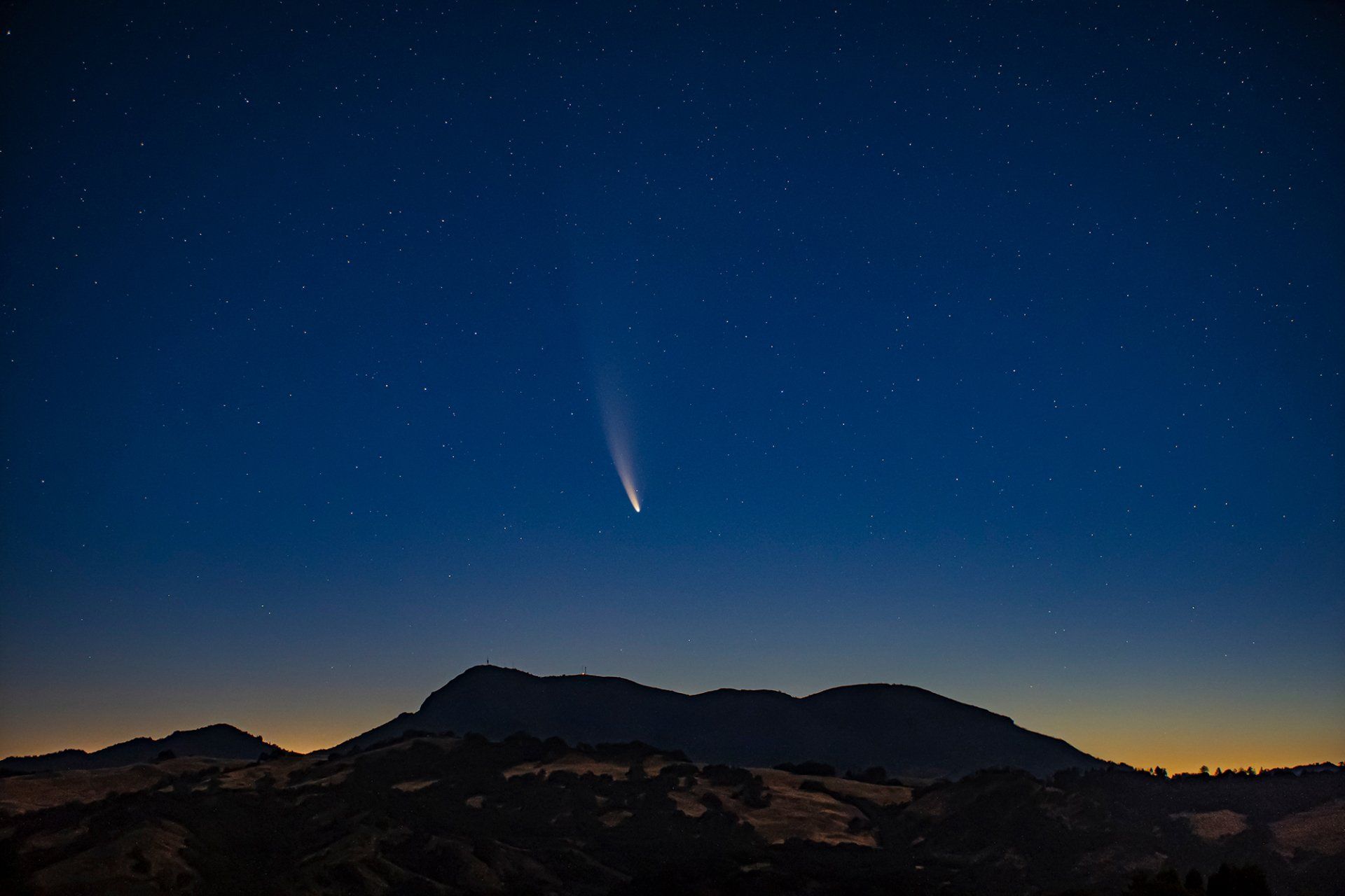 Comet NEOWISE soaring over Mt. Saint Helena at dawn in Northern California.