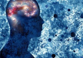 A silhouette of a person 's head with a galaxy in the brain.