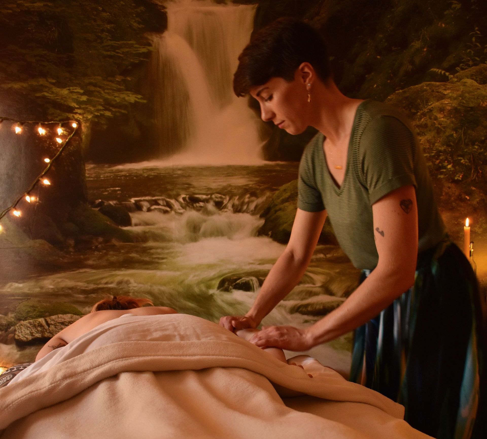 A woman is getting a cupping massage at a spa.