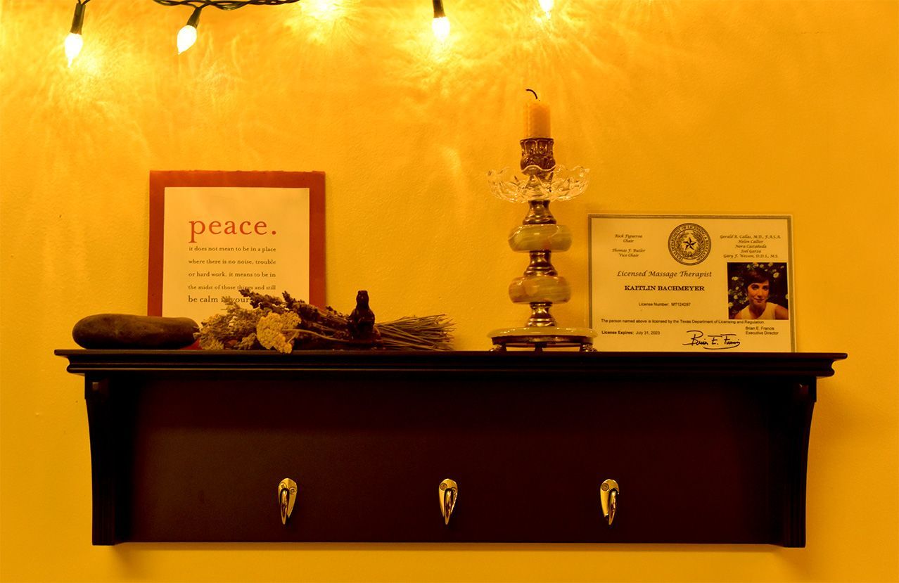 A shelf with a sign that says peace on it