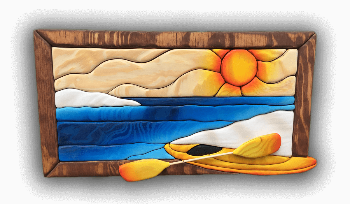 A custom Intarsia Art piece by Nick Vidakovic of a kayak in the ocean