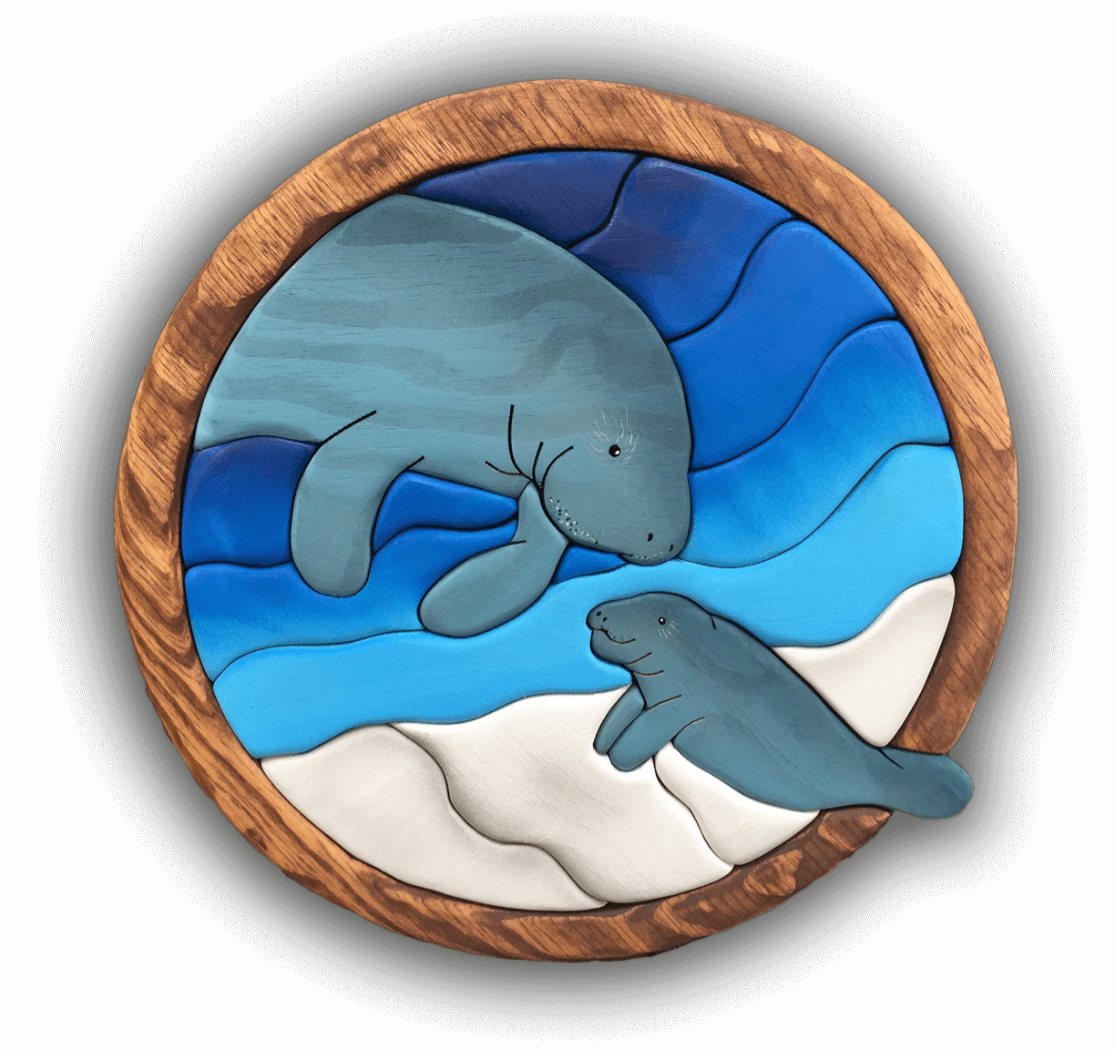 A custom Intarsia Art piece by Nick Vidakovic of two manatees