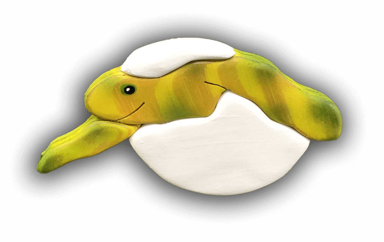 A stuffed animal that looks like a turtle with a white head