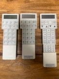 The original C.O.R.E. remote is left of 2 similar PIC series remotes.