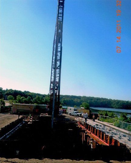Construction Site and Crane Equipment- Pile Driving in Canton, MA