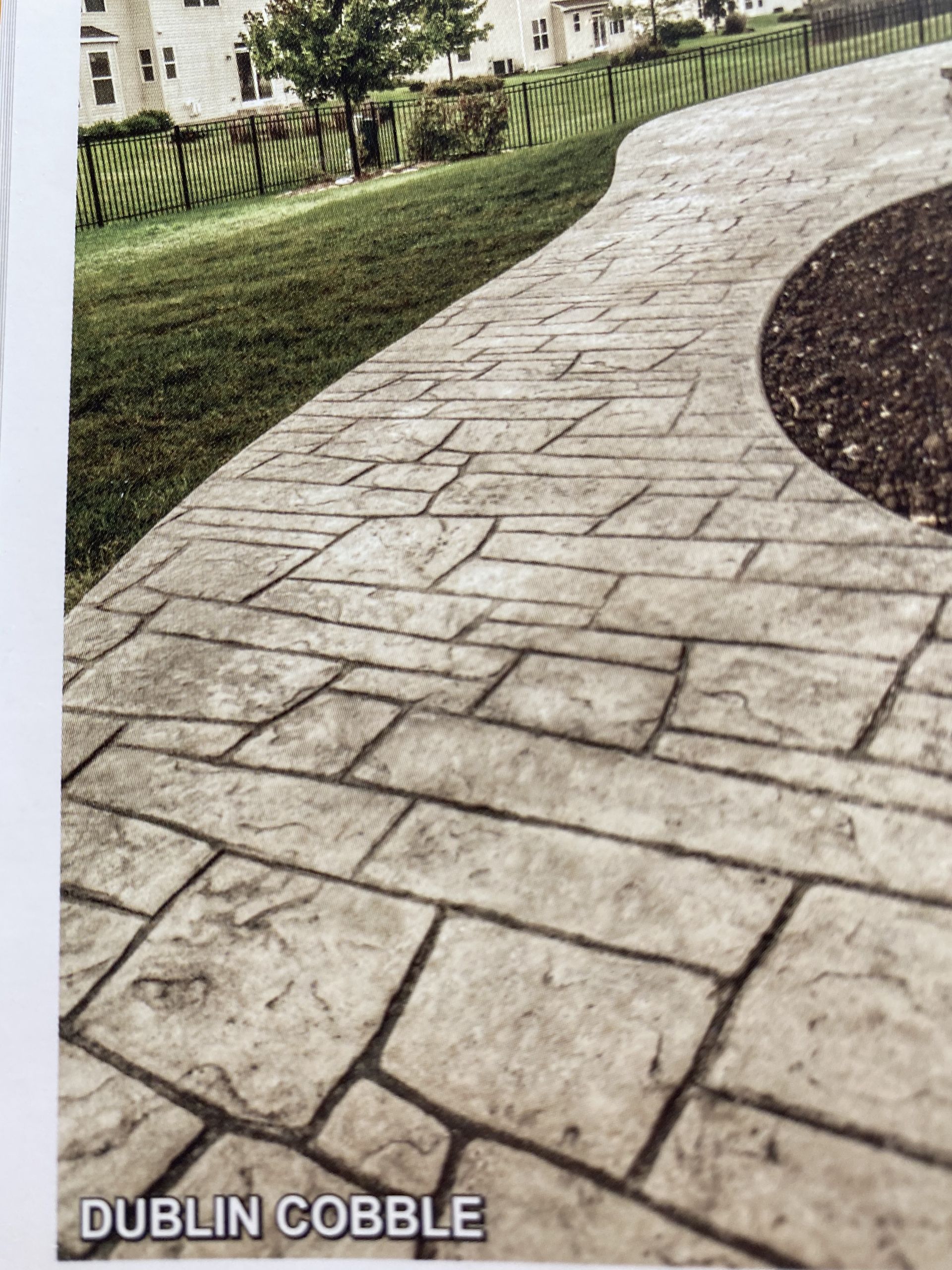 A picture of a brick walkway that says dublin cobble