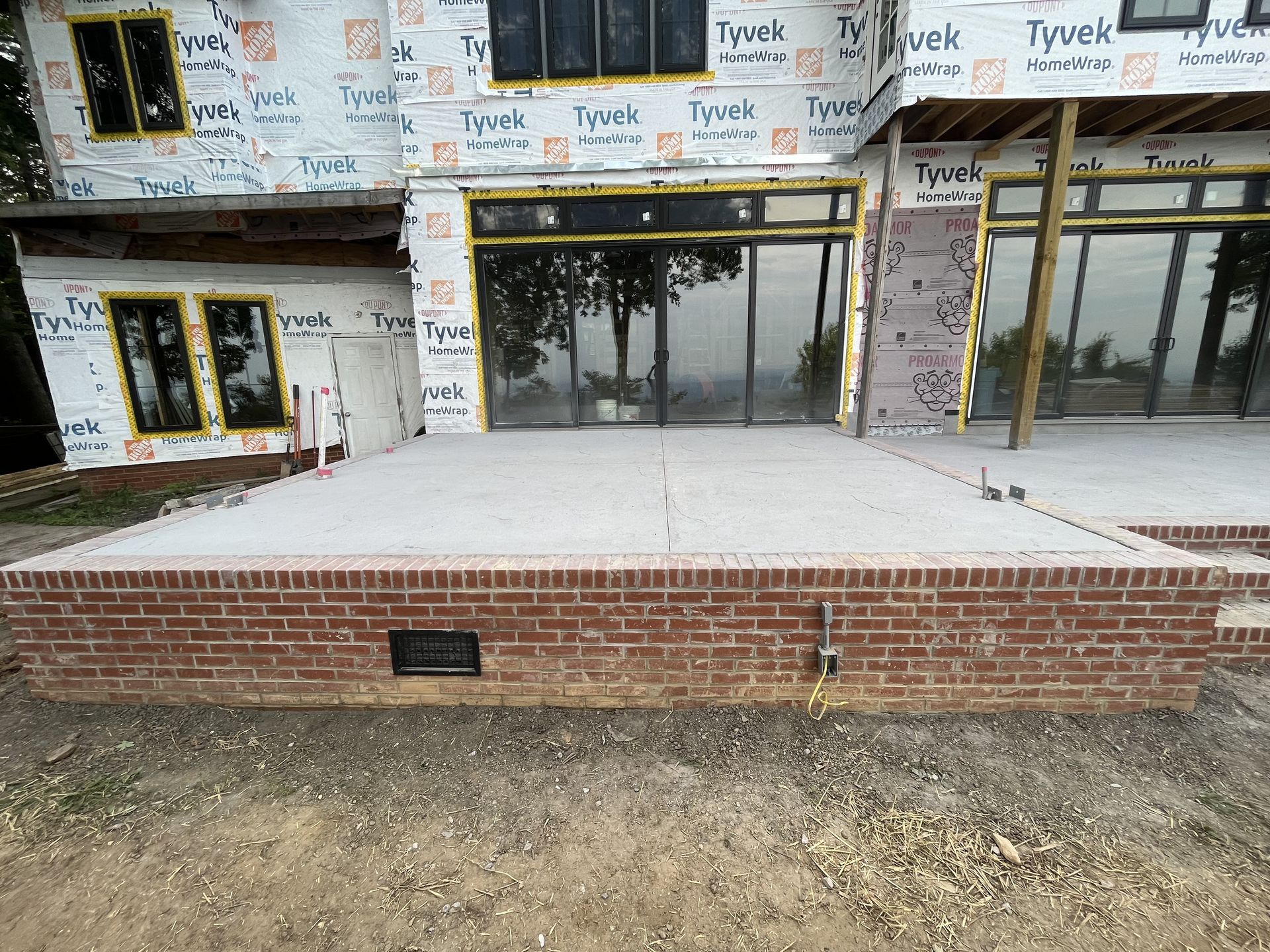 A house is being built with styrofoam and bricks