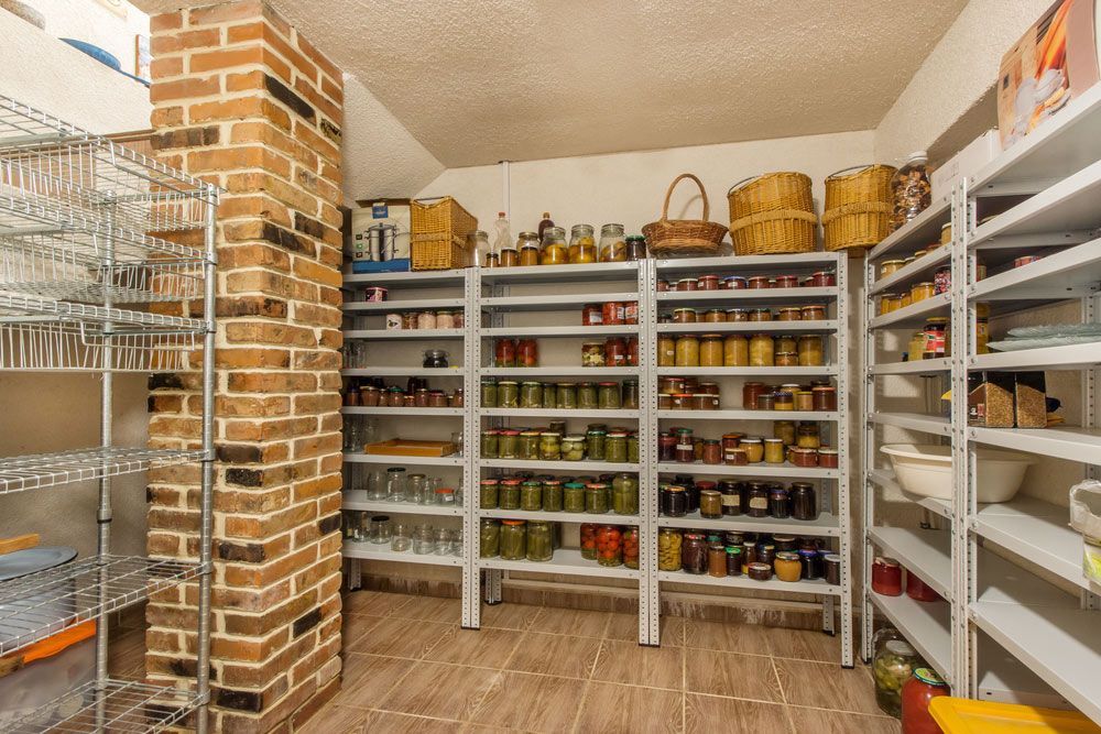 A Pantry Filled With Lots Of Jars And Cans Of Food — Remote Shopping Services In Edge Hill, QLD