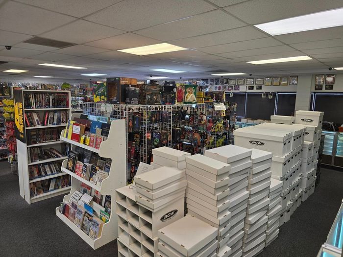 A Store Filled With Lots Of Books And Boxes — Aurora, CO — All C's Collectibles