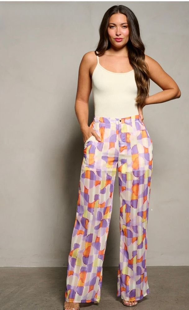 GEOMETRIC PRINT HIGH-WAISTED WIDE LEG PANTS IN WHITE, PURPLE AND ORANGE.