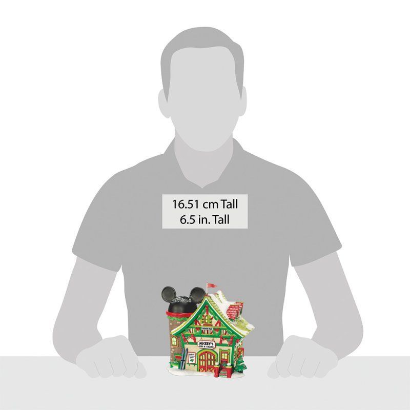 Groen-wit Mickey Mouse-vakantiehuisje met hoogtevergelijking.