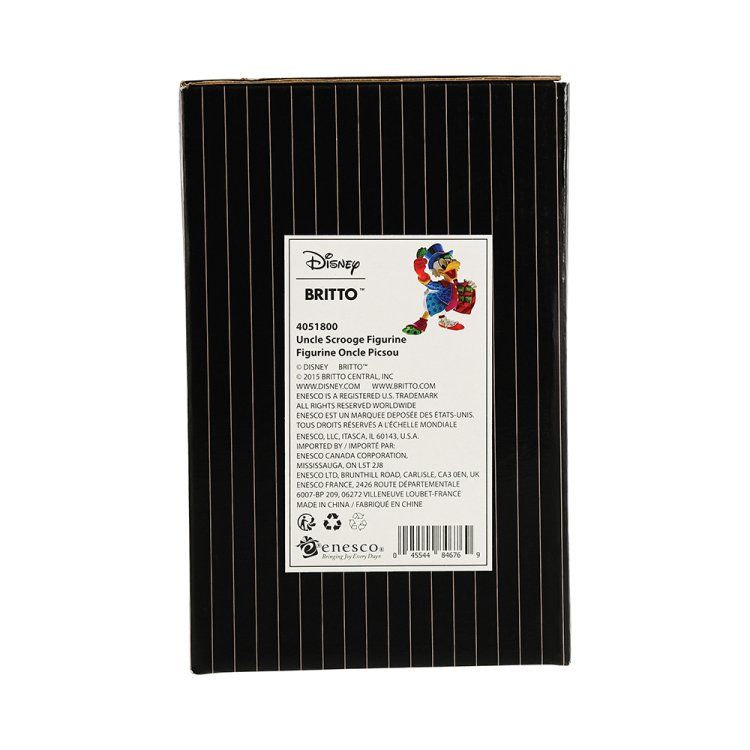 Kleurrijk beeldje van Dagobert Duck met geld, een hoge hoed en een geldzak.