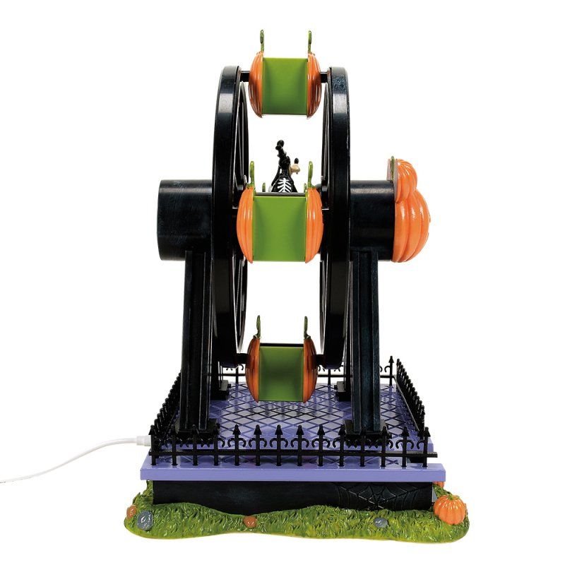 Een Halloween-reuzenrad met een zwart frame, oranje pompoenen en een heksenfiguur.