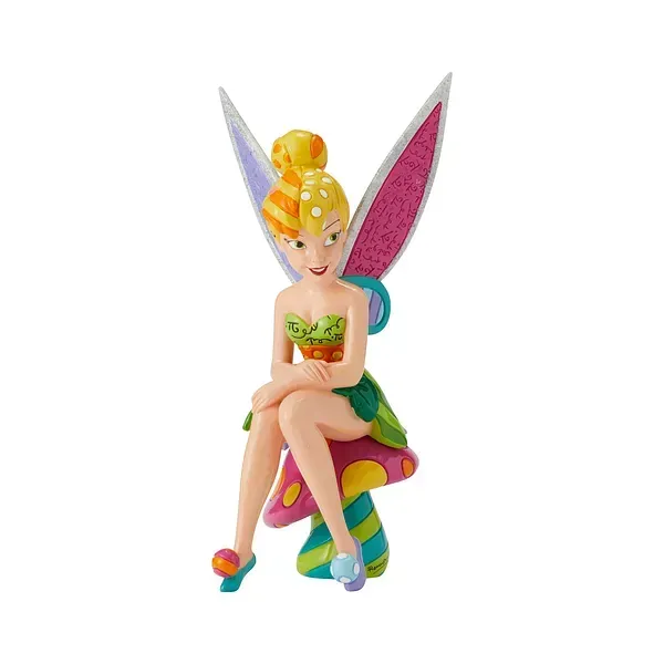 Een Tinkerbell-figuurtje dat op een kleurrijke paddenstoel zit, met roze vleugels, een groene jurk en geel haar.