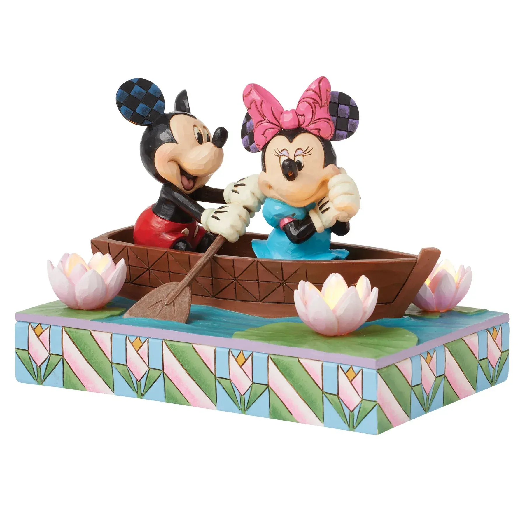 Mickey Mouse en Minnie Mouse roeien in een bootje in een vijver.
