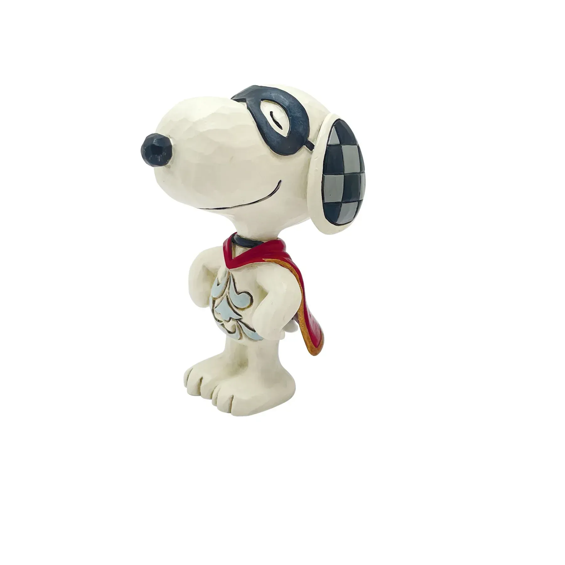 Een beeldje van snoopy met een cape en een bril