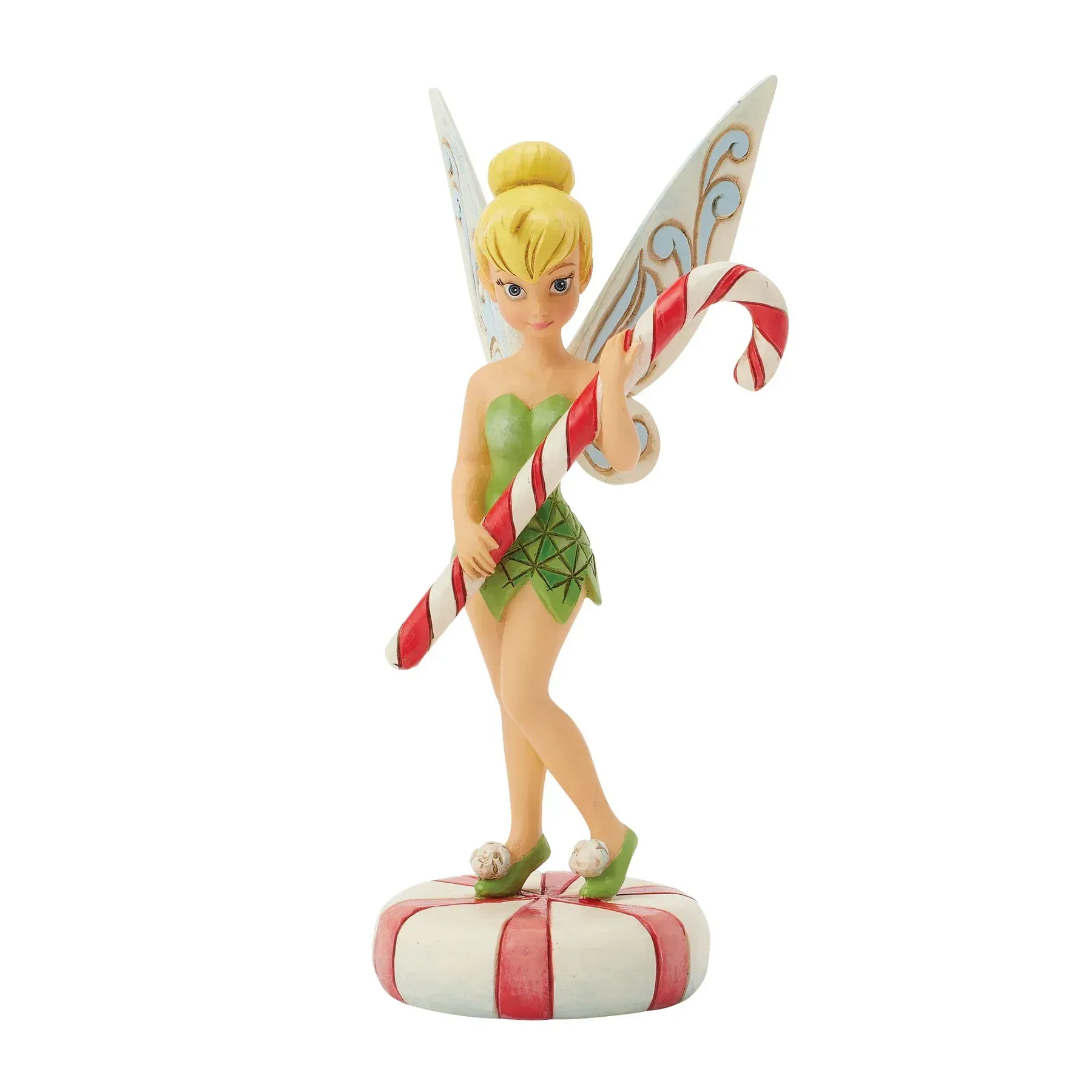 Een Tinkerbell-beeldje houdt een zuurstok vast.