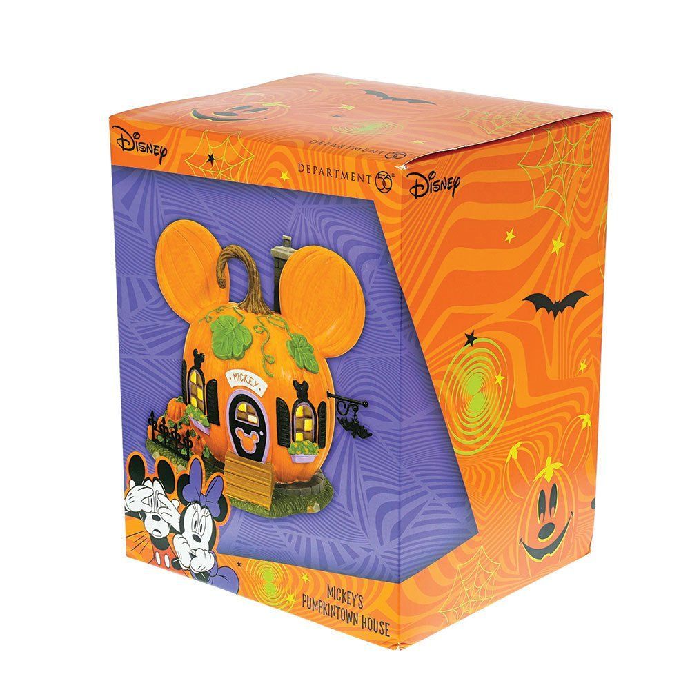 Een doos met een Disney Halloween-thema, met een Mickey Mouse-huisje in de vorm van een pompoen. In de kleuren oranje, paars en zwart.