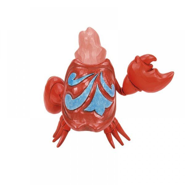 Een rode krab met een blauw en rood ontwerp erop