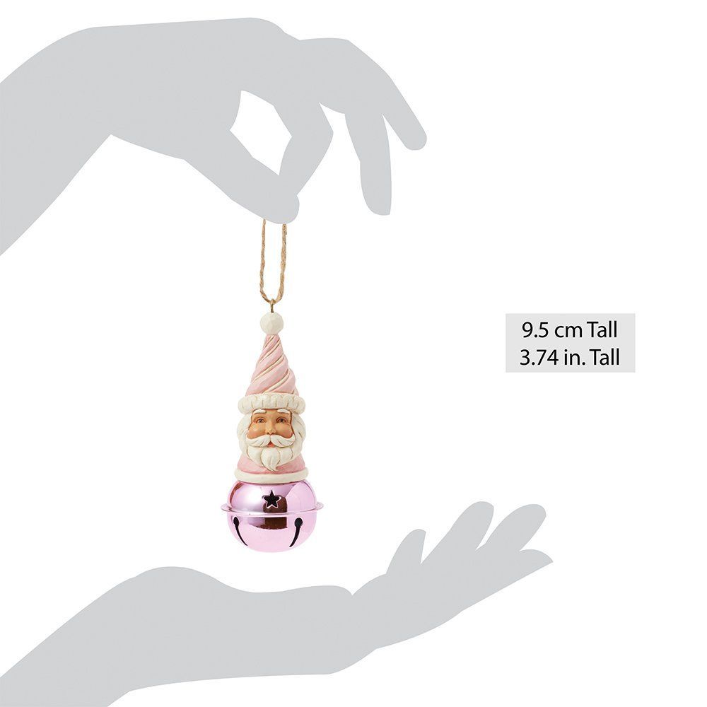 Een roze bel met daarop een kerstmannenhoofd.