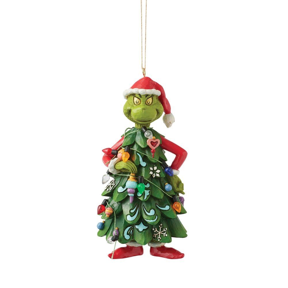 De Grinch is verkleed als kerstboomversiering.