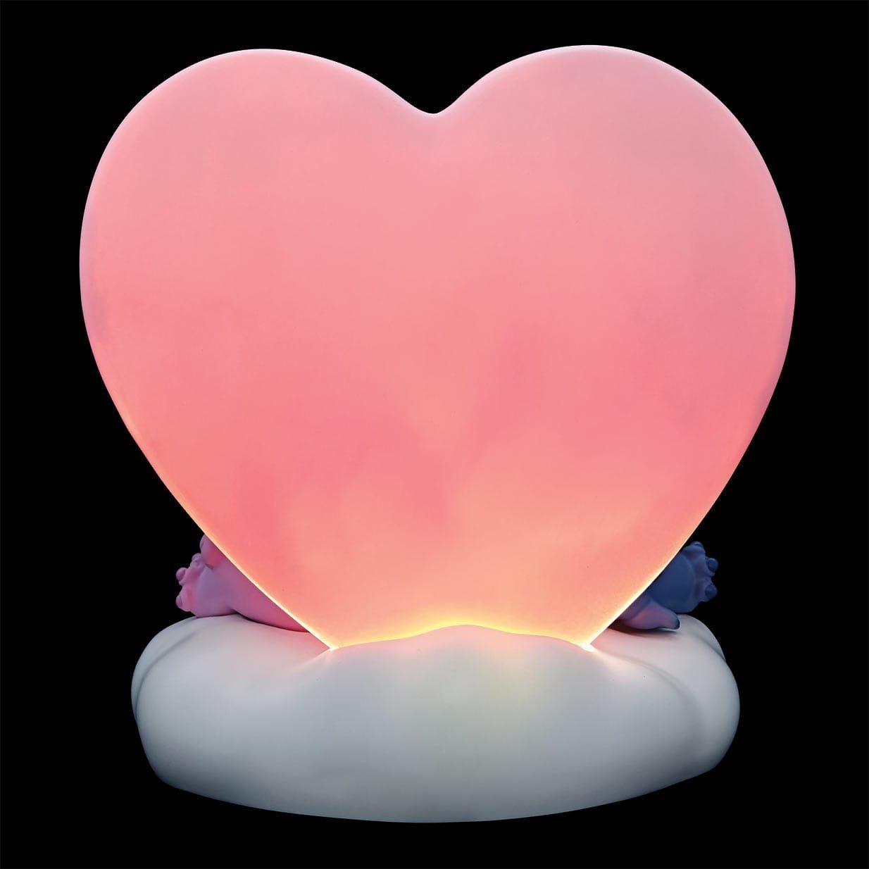 Een roze hartvormig licht op een zwarte achtergrond