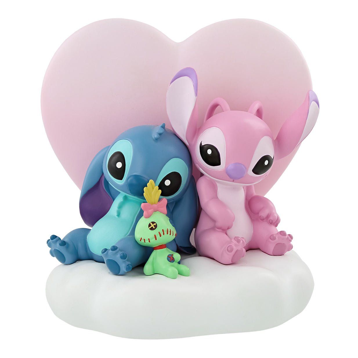 Stitch en Angel zitten naast elkaar voor een roze hart.