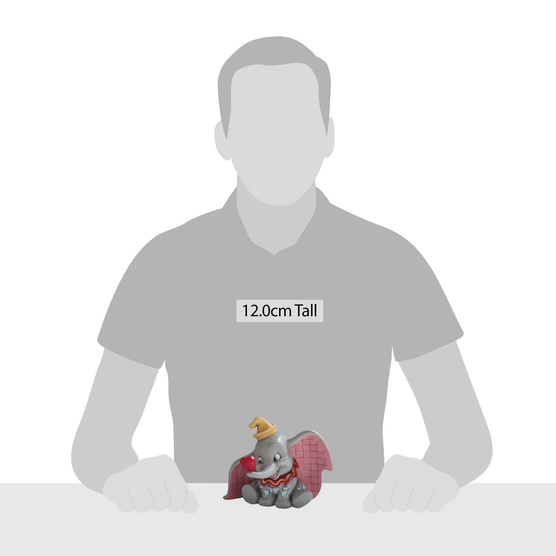 Een beeldje van dumbo uit de disney film dumbo