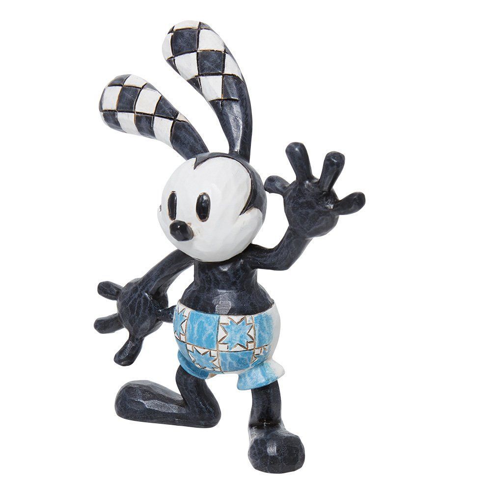 Een zwart-wit beeldje van Mickey Mouse in een blauwe korte broek.