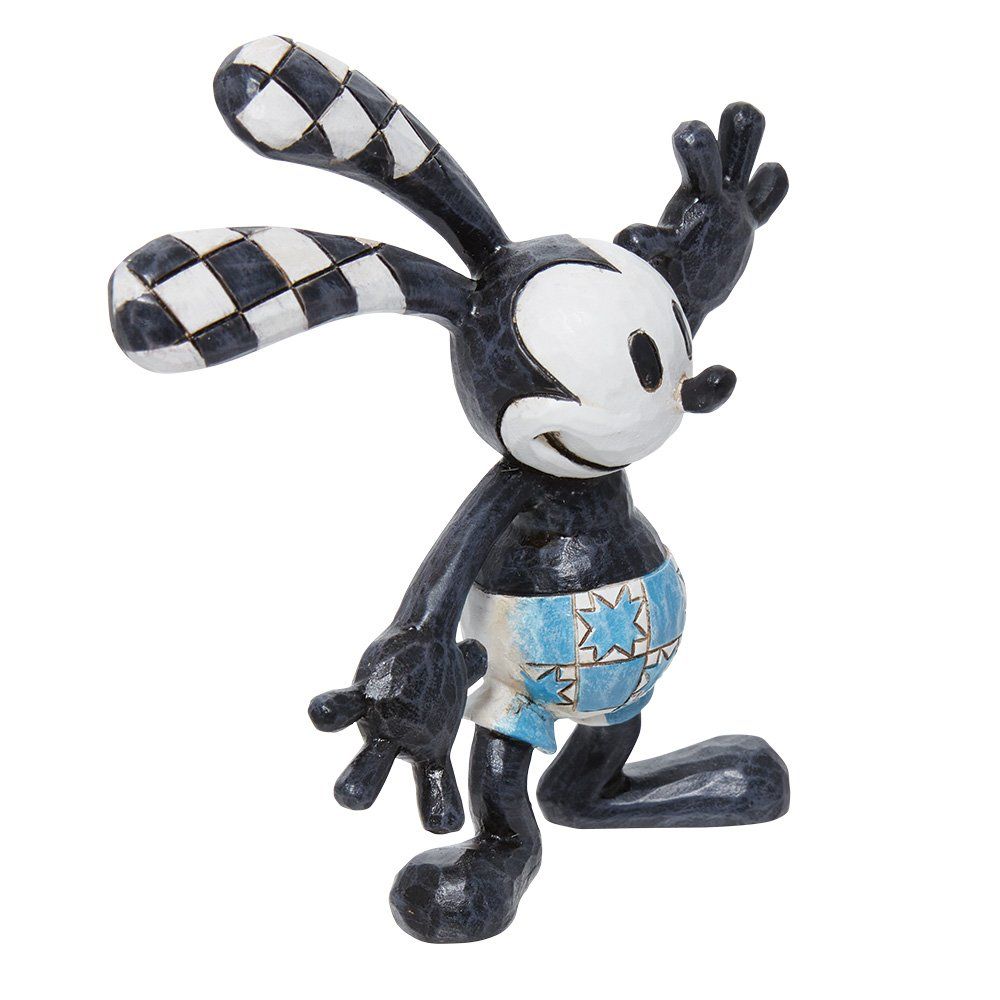 Een zwart-wit beeldje van Mickey Mouse in een blauwe korte broek.
