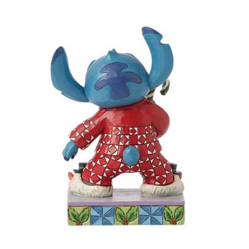 De achterkant van een beeldje van Stitch van Disney is te zien.