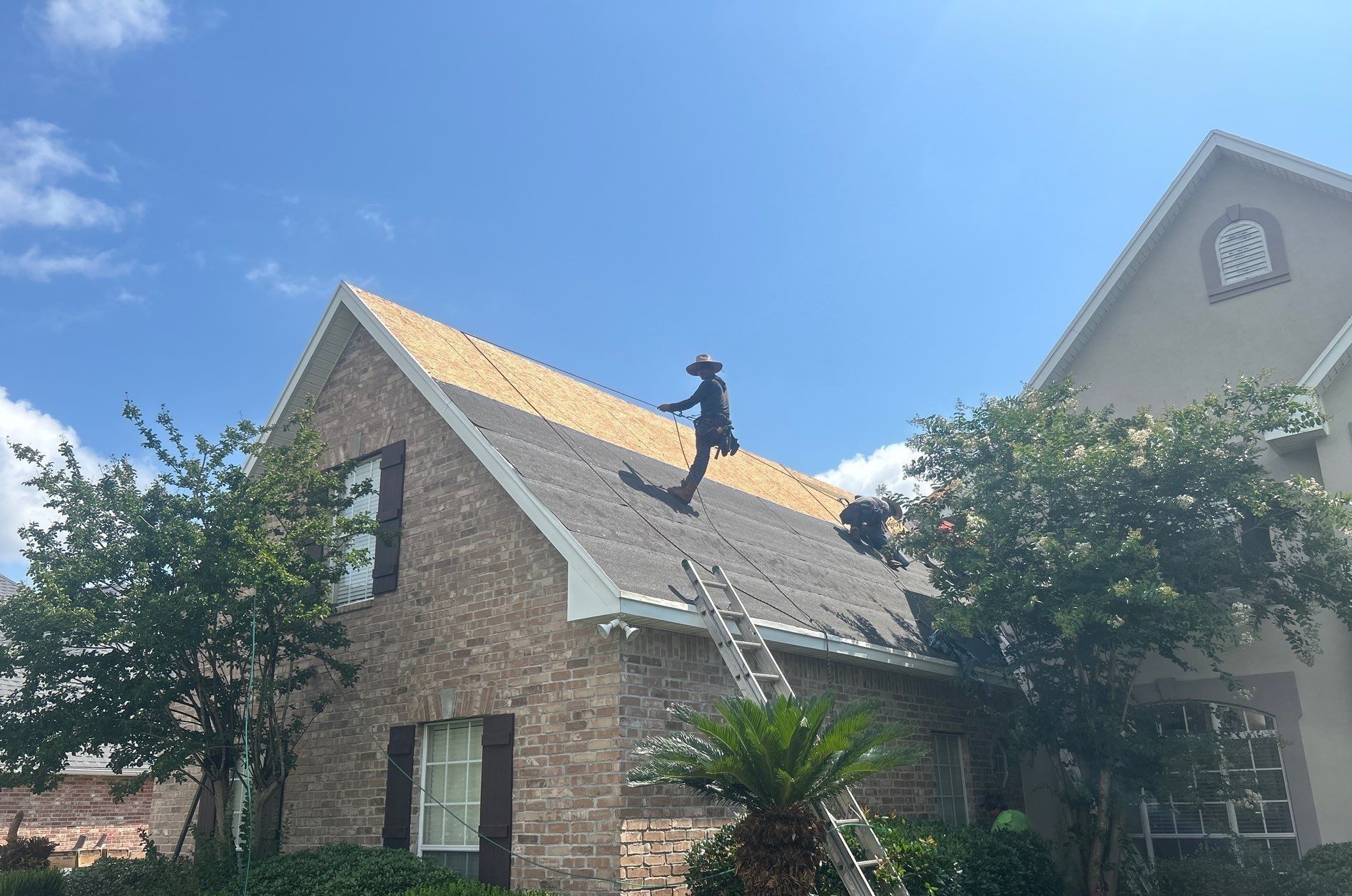 Roofer on roof
