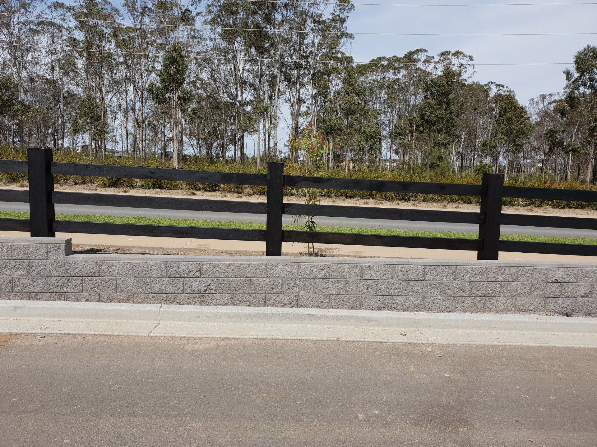 Black Wooden Fence — Fences in Aylmerton, NSW