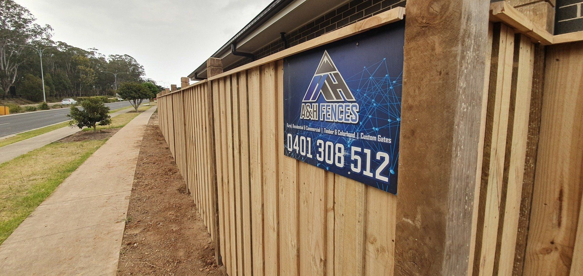 Wooden Fences with Signage — Fences in Aylmerton, NSW