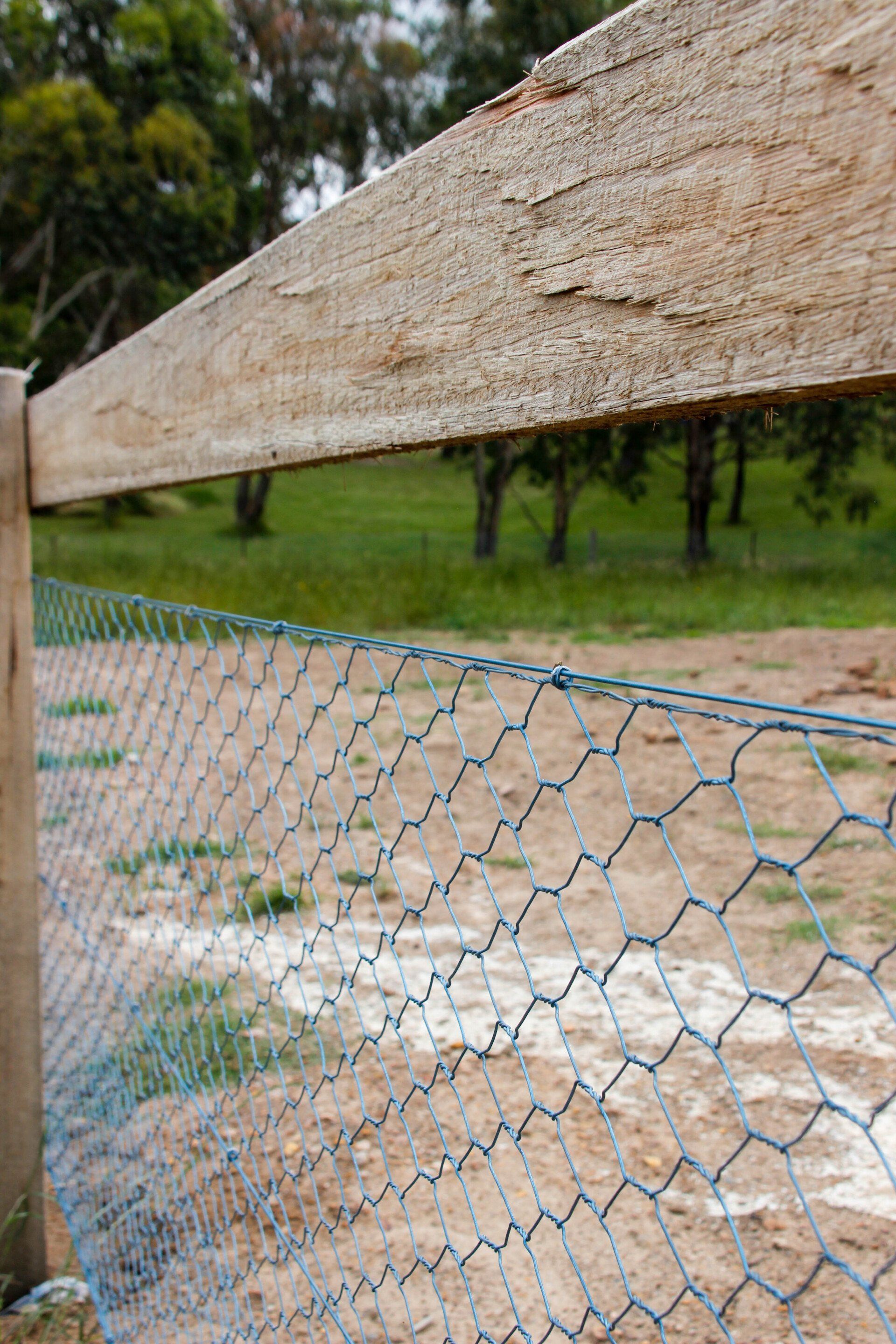 Aluminum Mesh Fence With Wood Railings — Fences in Aylmerton, NSW