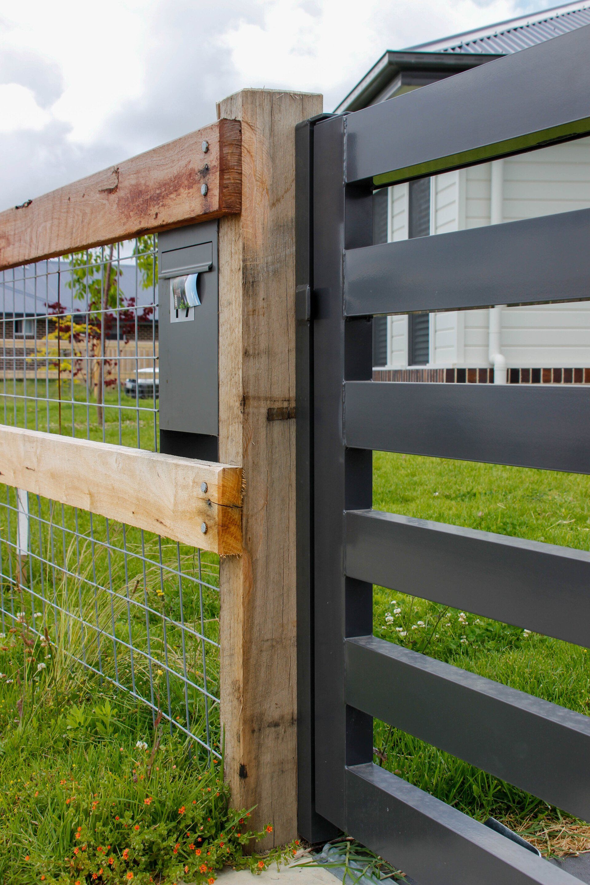 Black and Timber Fence — Fences in Aylmerton, NSW