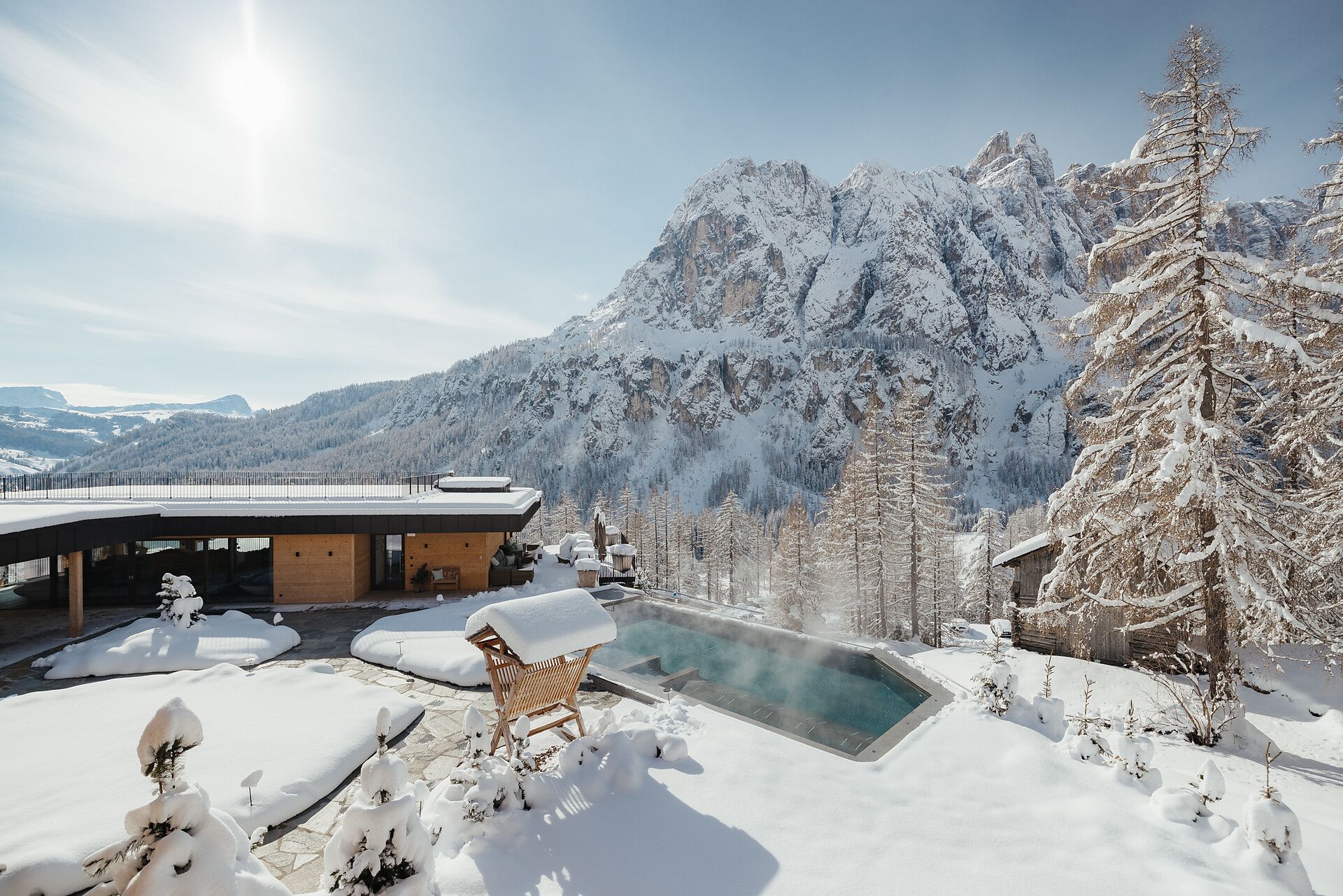 Notepad on map, with nut shells and paper boat.