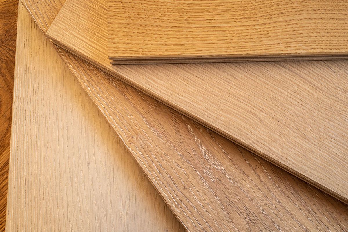 Close-up of light brown wood samples in different shapes and arrangements.