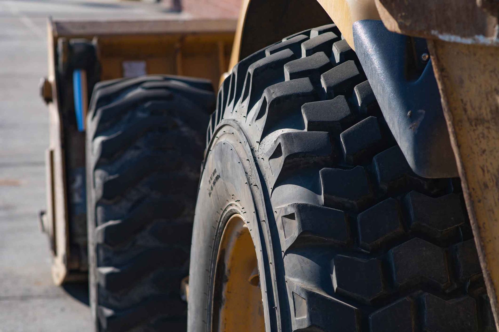 A close up of a tire on a construction vehicle