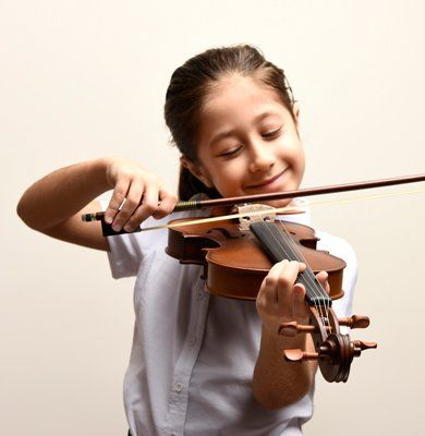 A Happy Little Girl Playing Violin — Carmel, IN — Carmel Music Academy