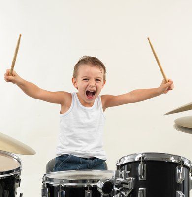 A Hyped Kid Playing Drums — Carmel, IN — Carmel Music Academy