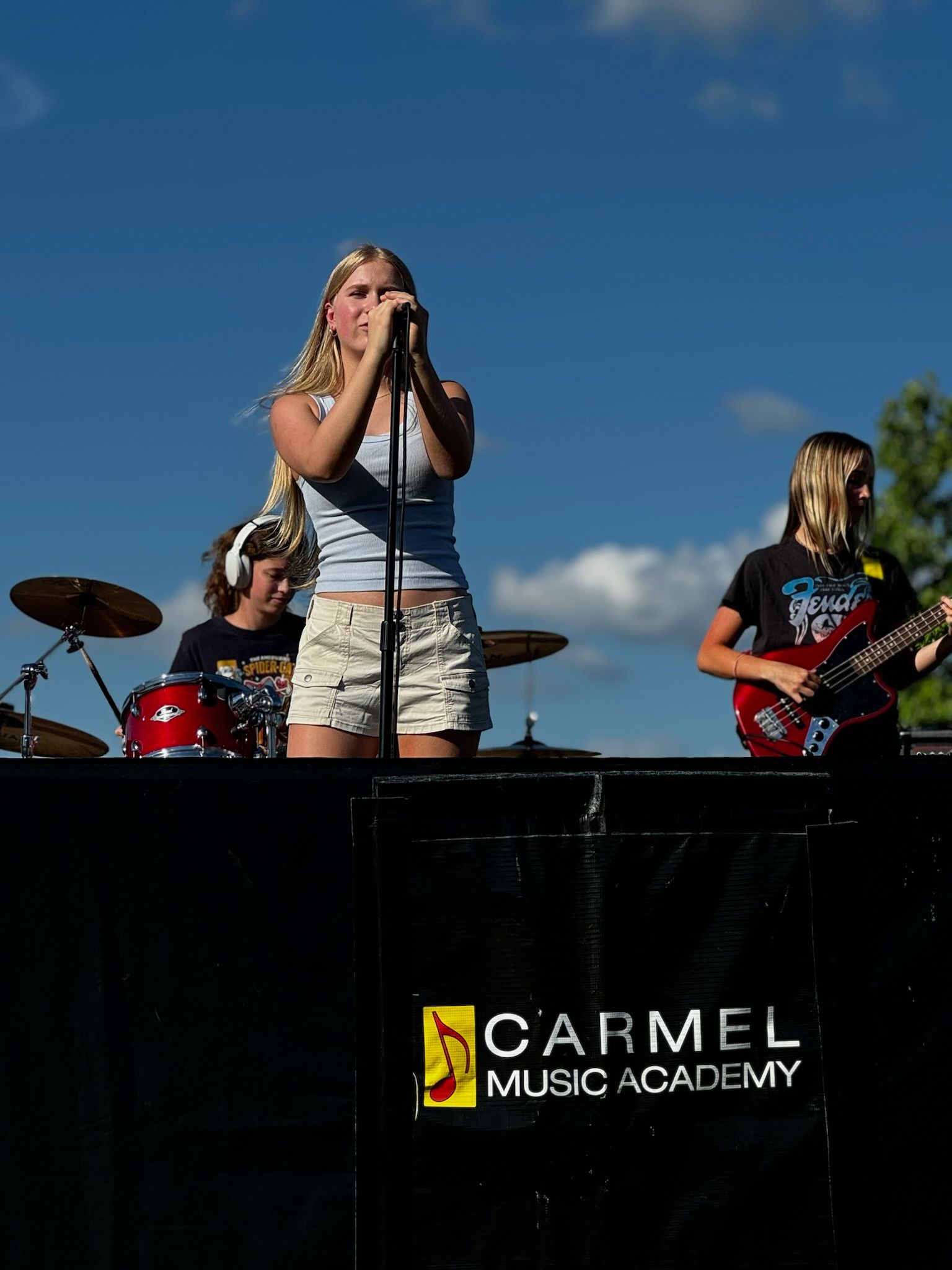 Female Student Learning Guitar — Carmel, IN — Carmel Music Academy