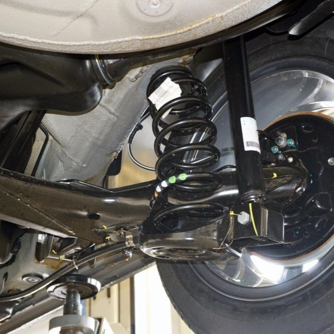 Undercarriage of a Vehicle Showing a Coil Spring — Alice Springs Auto Parts in Ciccone, NT