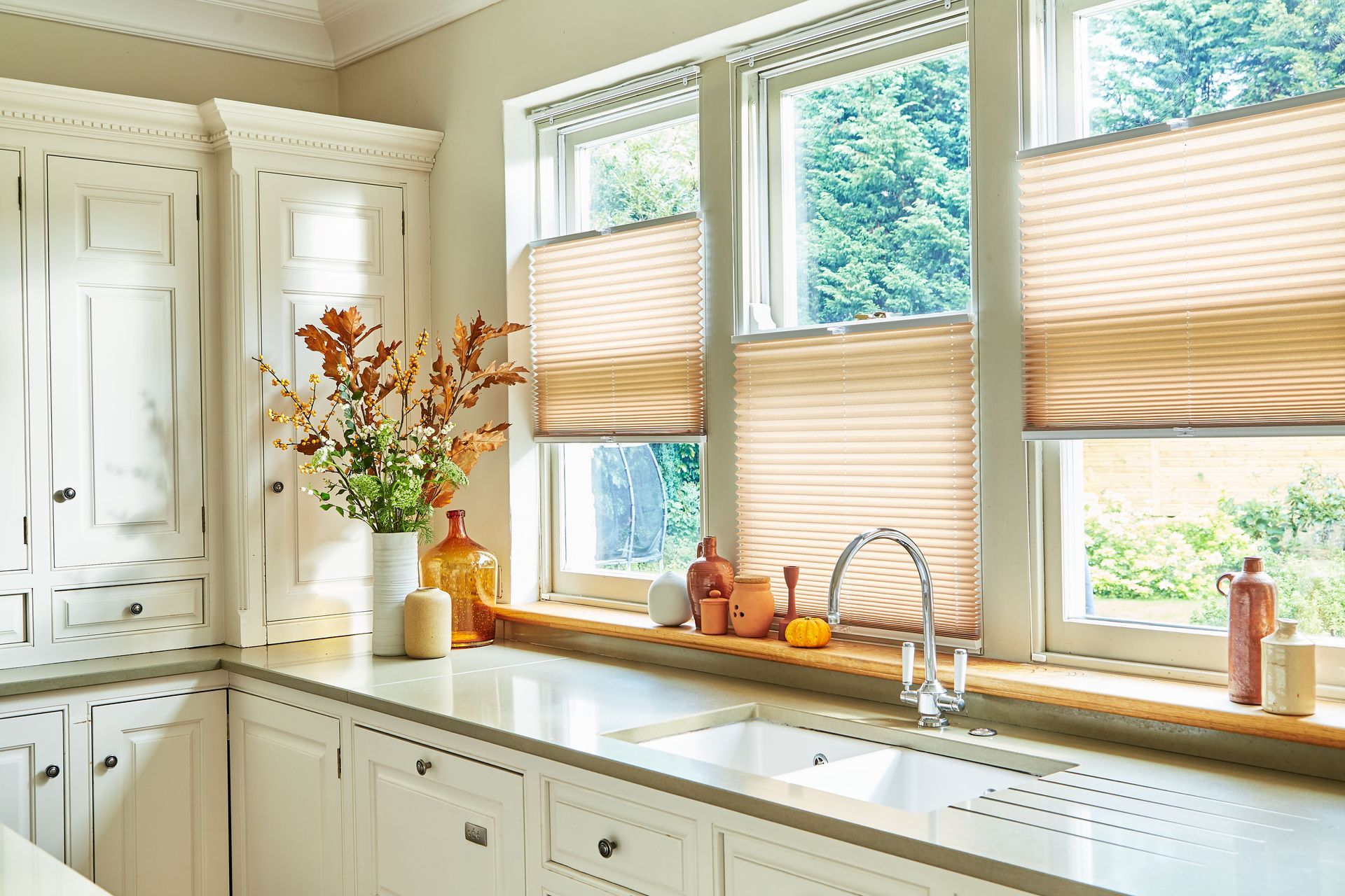 Tensioned pleated blinds