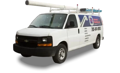 White service van with roof rack carrying pipe and ladders, logo on side, phone number visible.