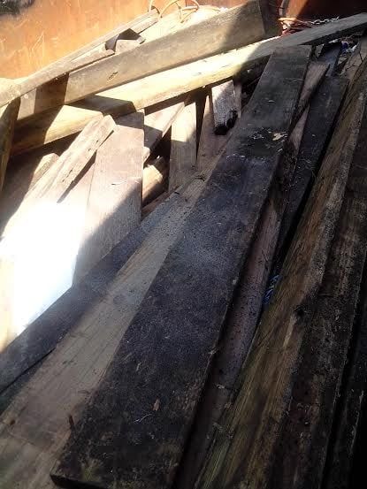 A pile of wood sitting on top of each other on a table.