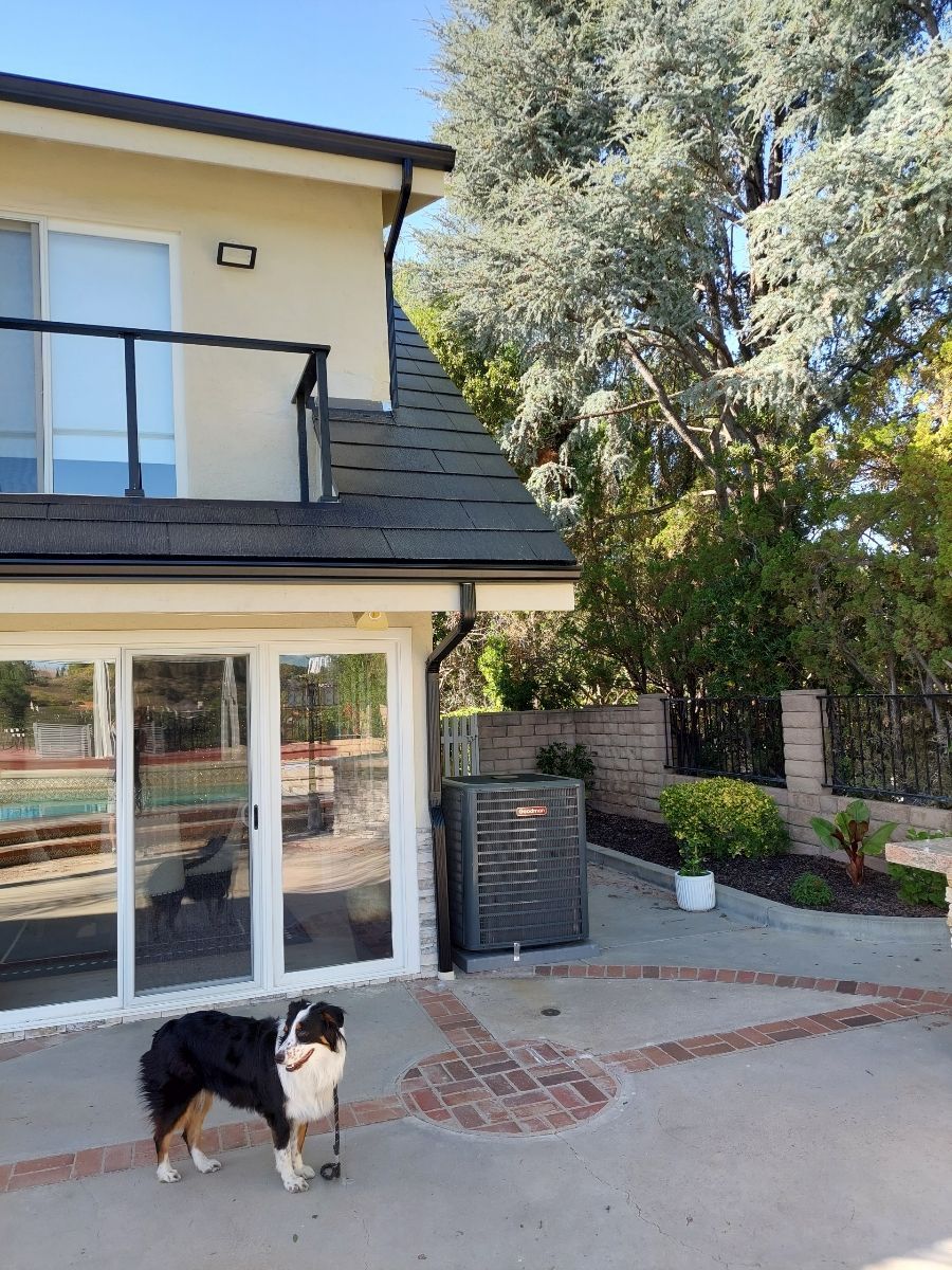 two story shingle roof gutters