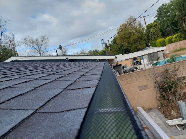 low slope shingle roof gutter screens